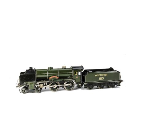A Märklin 0 Gauge Clockwork Southern Railway ‘Merchant Taylors’ 4-4-0 Locomotive and Tender, in SR Maunsell green as no 910, 