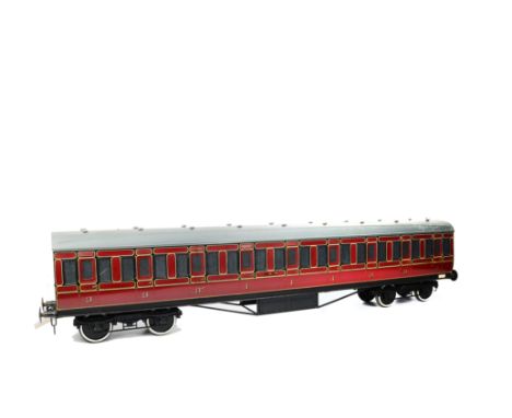 A 5” Gauge Fibreglass-bodied LMS Non-corridor Coach by Aristocraft, overall length 61”, in LMS maroon as 1st/3rd Composite no