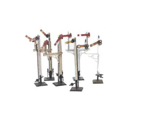 A Group of 0 Gauge Signals by Bassett-Lowke and Märklin, comprising Home and Distant single signals, 3 bracket signals by Bas