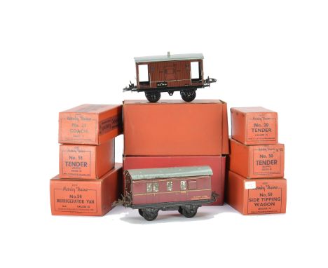 Hornby 0 Gauge Boxed No 50 Freight Stock and others, all in red boxes, comprising hopper, low side with meat container and ca