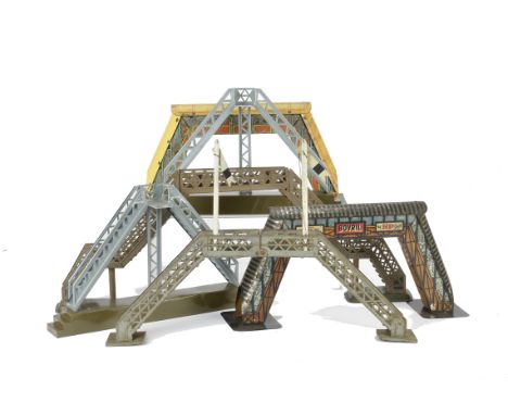 A Collection of 0 Gauge Footbridges by Bing and Brimtoy, including two different hinged versions by Bing, one of which has 2-
