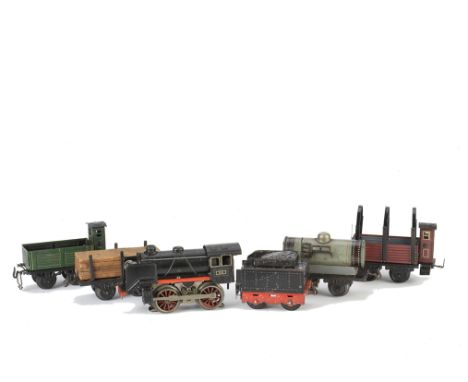 A Bub 0 Gauge AC Electric Locomotive Tender and Freight Stock, the locomotive with reversing switch to cab and in German blac