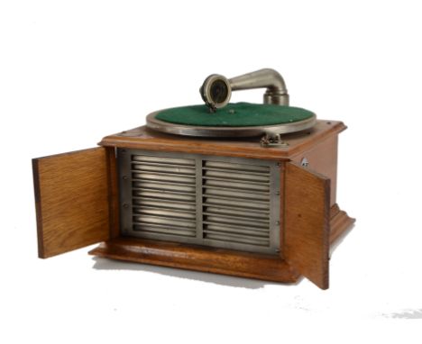 Hornless gramophone: a Cinch, early model with metal grille, now with Gramophone Co. Exhibition soundbox (no winder) 
