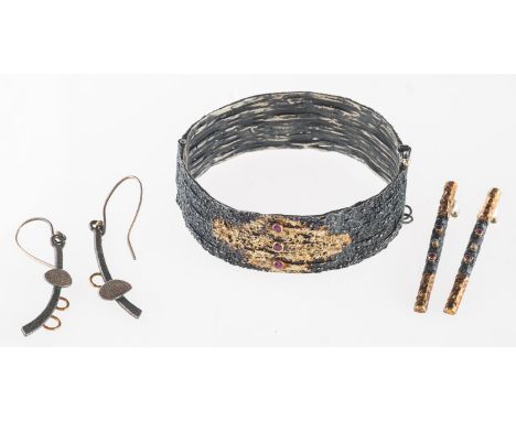 Apostolos. A ruby bangle, ruby &amp; diamond earrings and one other pair of earrings, the wide hinged bangle of bi-colour and