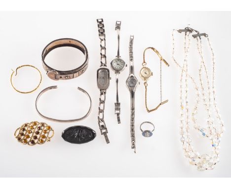 A mixed group of silver and costume jewellery, including a silver Victorian buckle bangle with ornate carving to front panel,