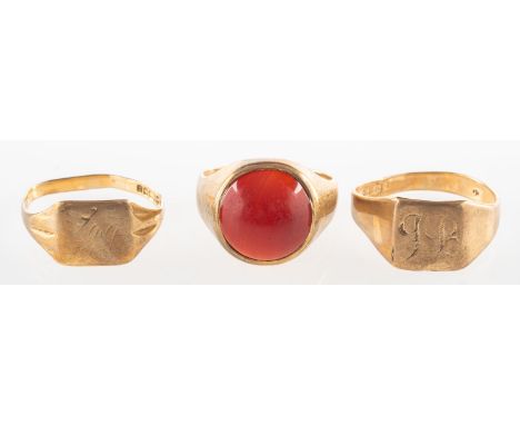 A group of three 9ct gold signet rings, including two rectangular signet rings, both with faint monograms to front panels, bo