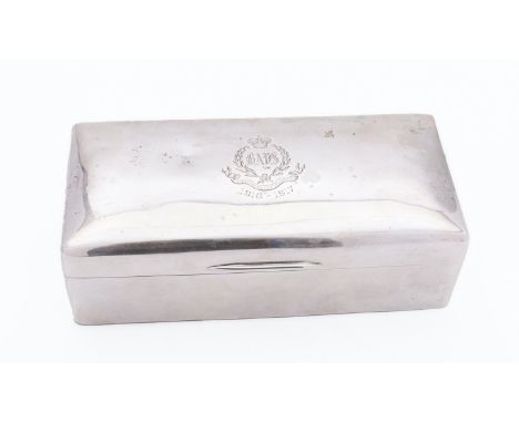 A George V silver cigarette casket by Harrods Services Ltd, London 1916, of rounded rectangular form, the hinged lid engraved