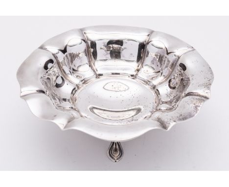 A George V silver bowl by Atkin Brothers, Sheffield 1928, lobbed circular form, raised on four moulded pad feet, 19.4cms., (7