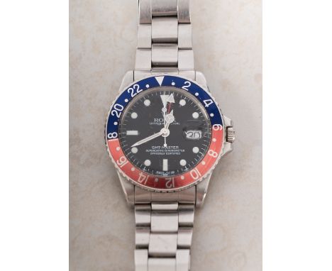 Rolex G.M.T. Master a gentleman's stainless-steel Oyster perpetual wristwatch with Pepsi red and blue bezel the black dial wi