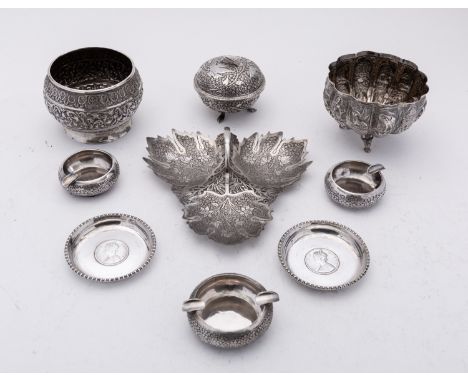 A mixed group of Indian silver including;  a Kutch silver bowl of globular form, with scrolled decoration  7.5cms. high, thre