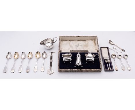 A mixed group of silver including; a cased Edward VI three piece cruet set by Walker and Hall, Birmingham 1909, comprising of