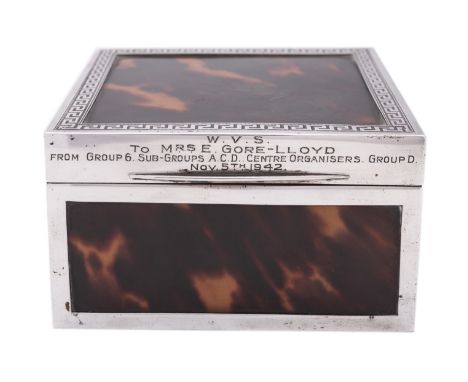 A George V silver and tortoiseshell cigarette box by Mappin & Webb, Birmingham 1927, of square form, silver frame with panels