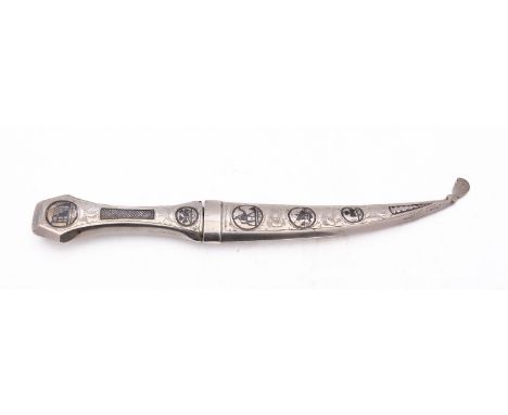 A mid 20th century Iraqi Marsh Arab Janbiya dagger, two marks on the scabbard, with a silver blade, 25.4cm, 68gs., (2.1ozs)