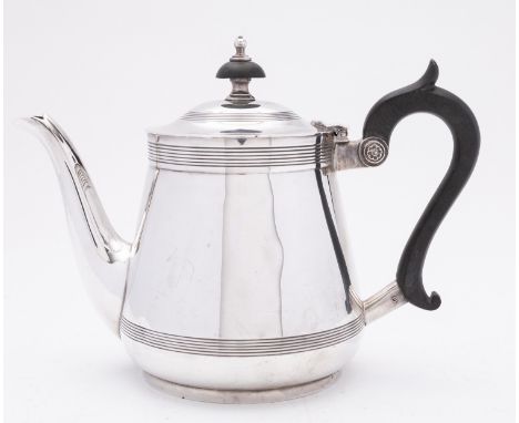 A George V silver tea pot by Walker &amp; Hall Ltd, Sheffield 1925, of inverted tapering form, the domed hinged lid with ebon