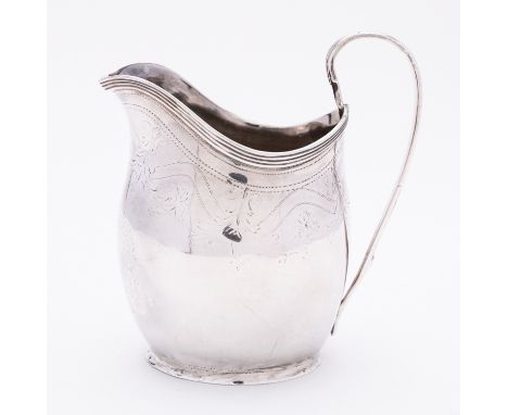 A George III silver cream jug maker's mark rubbed, London 1799, of helmet shape, with reeded rim and C shaped handle, prick- 