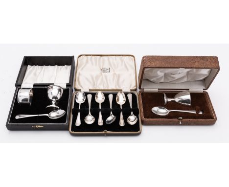 A mixed group of silver including; a cased egg cup and spoon by Walker and Hall, Sheffield 1939, a cased egg cup, spoon and n