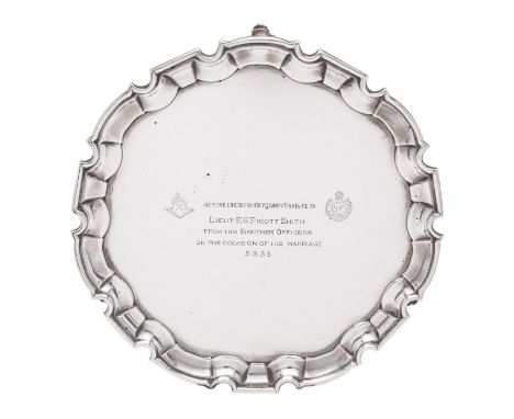 A George VI silver salver, William Hutton & Son Ltd, Sheffield 1937, of circular shape, with pie crust border,raised on scrol