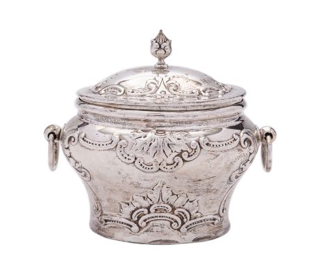 A Victorian silver tea caddy by Holland, Aldwinckle & Slater, London 1899, of casket form, the domed hinged lid with cast aco