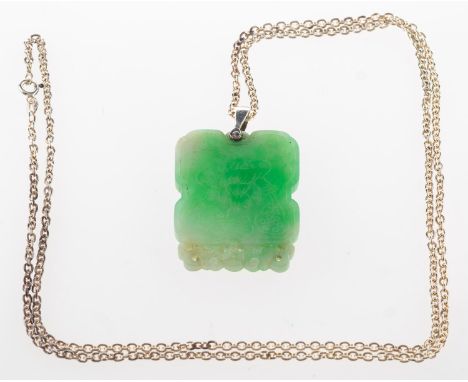 A jade pendant with chain, a carved jade pendant depicting a bird and flowers to one side and a Chinese symbol to the other, 