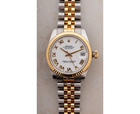A lady's Rolex Datejust Oyster Perpetual two-tone gold and stainless-steel wristwatch the round white dial with raised gold R