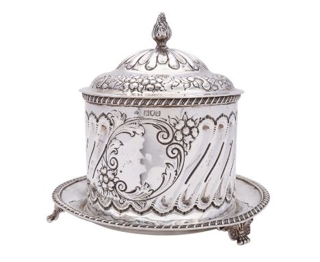 A Victorian silver biscuiteer or biscuit box by William Hutton & Sons Ltd, London 1899, of circular form, the domed hinged li