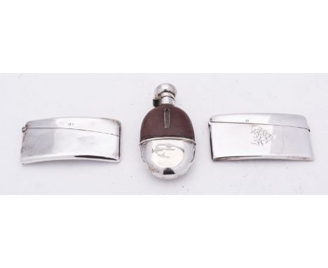 A Victorian silver and glass hip flask by Minshull & Latimer, Birmingham 1891, of small oval form, bayonet lid, half leather 