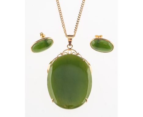 A New Zealand jade pendant, chain and a pair of stud earrings, the pendant set with a large oval New Zealand jade cabochon in