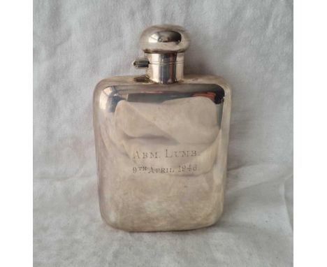 A hip flask of curved outline and bayonet cover, 5” high, Sheffield 1945, 143 g.