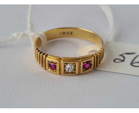 AN EDWARDIAN RUBY AND DIAMOND GYPSY SET RING, 18ct, size O, 2.9 g.