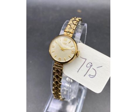 A ladies Tissot wrist watch, 9ct