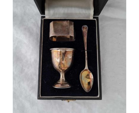 A boxed egg cup spoon and napkin ring, Birmingham 1939