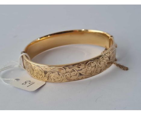 A rolled gold bangle