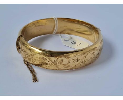 A rolled gold bangle