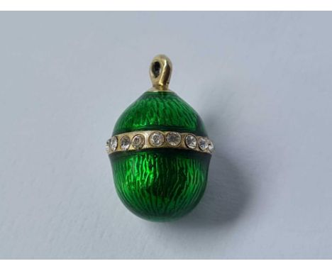 A pretty enamel and paste egg charm