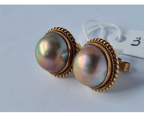 A large pair of mabe pearl earrings 9ct 8.7gms