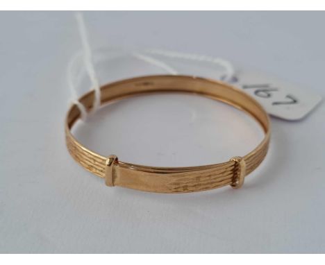 A babies 9ct christening expandable bangle 1.4g