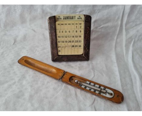 A propertual calendar holder and thermometer holder case (London 1908)