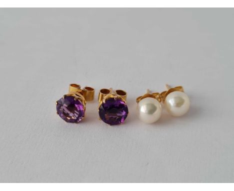 A pair of pearl stud earrings, 14ct, together with gold and amethyst stud earrings