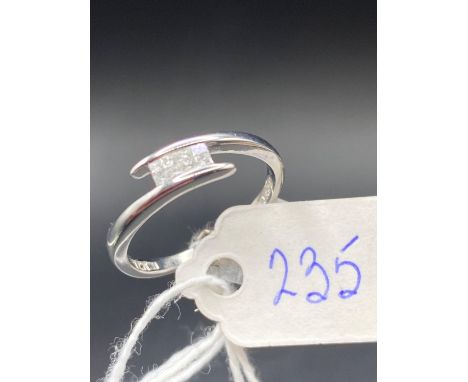 Square cut diamond cross over ring in 9ct white gold Size M