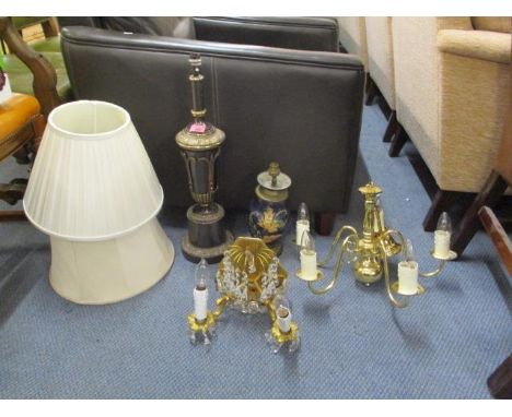 An assortment of lighting to include a gilt wall light with a similar ceiling light, a Regency style table lamp and a blue gl