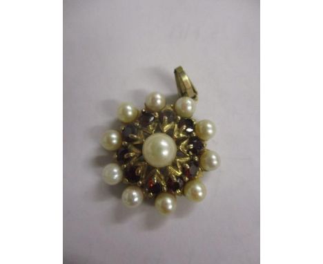 A 9ct gold pearl and ruby pendant 