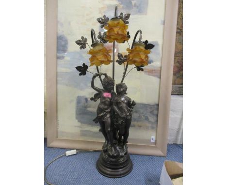 A mid 20th century composition large table lamp with three amber coloured shades, 35 1/4" h 