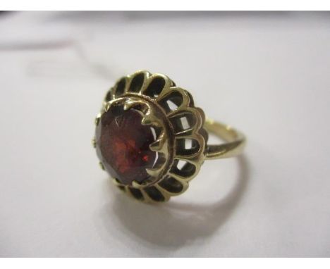 A 9ct gold garnet set ring 