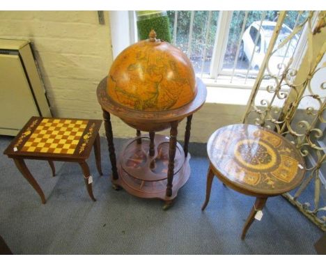 A vintage drinks globe, an Italian Sorrento games table, an inlaid occasional table 