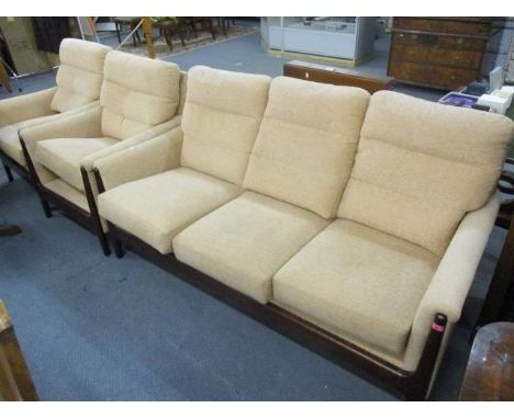 A modern three seater sofa and two armchairs with hardwood frames 