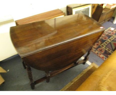 An early oak gate leg, D end dining table, 29" x 41 5/8" x 53", when extended, along with a set of eight Windsor style spindl