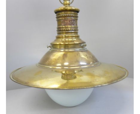 An early 20th Century London Brighton and South Coast Railway station lamp, brass with original opaque white glass, plaque 'L