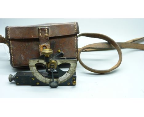 An antique clinometer, Barker &amp; Son, London, Mk.IV, No. 6003, 1917, in a leather case marked Jacob's &amp; Co., 1915 and 