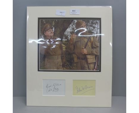 Dad's Army signed display; Arthur Lowe (Capt. Mainwaring) and John Le Mesurier (Sgt. Wilson) 