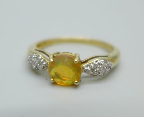 A 9ct gold Ethiopian opal ring with diamond shoulders, 1.6g, N 